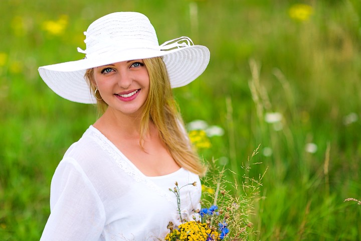 Woman in sunlit field