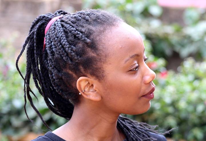 Woman with ethnic skin and braided hair