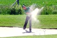 Golfer in sandy bunker