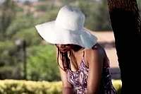 Wearing sun hat in garden